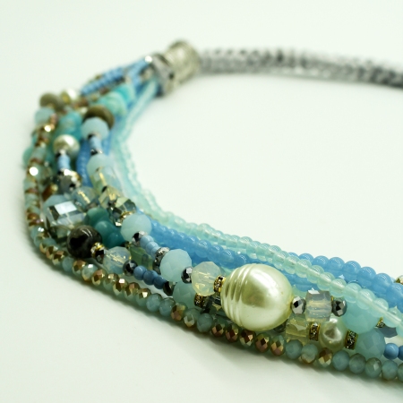 Ottaviani necklace with fabric and blue stones