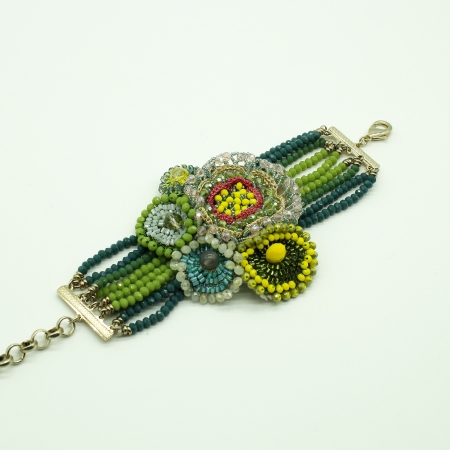 Ottaviani bracelet with faceted green stones with central flower